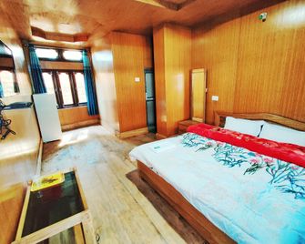 Hotel Tawang Centre Point - Tawang - غرفة نوم