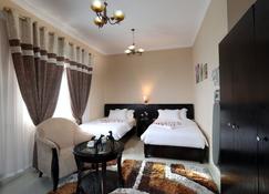 Al Smou Hotel Apartments - Ajman - Chambre