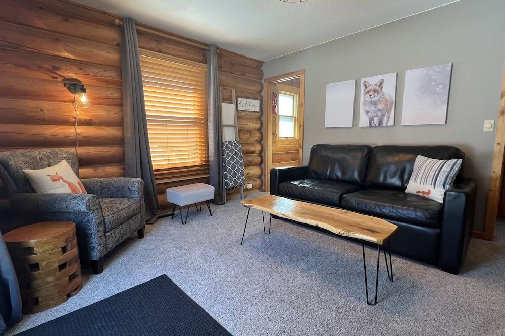 Living room view of Dancing Pines Suite Near Sju, Csb & Wobegon Trail