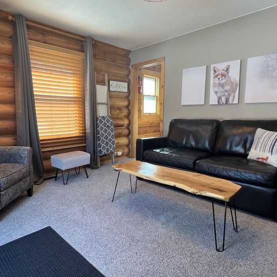 Living room view of Dancing Pines Suite Near Sju, Csb & Wobegon Trail