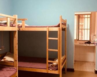Utopia Youth Hostel - 西双版纳傣族自治州 - 臥室