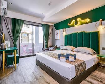 Neo Paly Hotel - Semporna - Bedroom