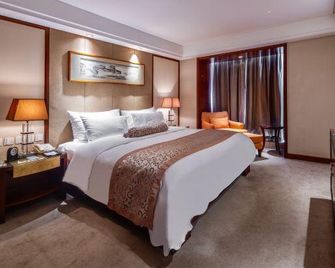 Huiyuan Apartment Hotel - Peking - Schlafzimmer