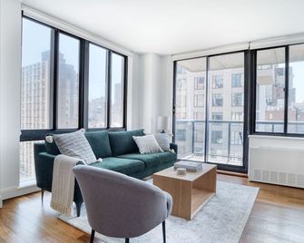 Fab Gramercy Park 1BR w/ Gym, Doorman & W/D, nr MSG, by Blueground - New York - Wohnzimmer