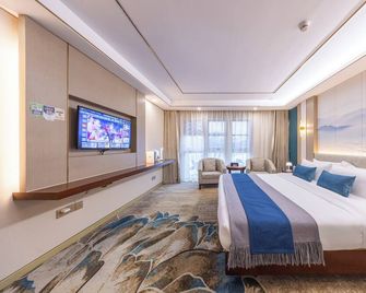 Xinrun Hua Hotel - Guangming City Station Hongqiao Park Branch - Dongguan - Camera da letto