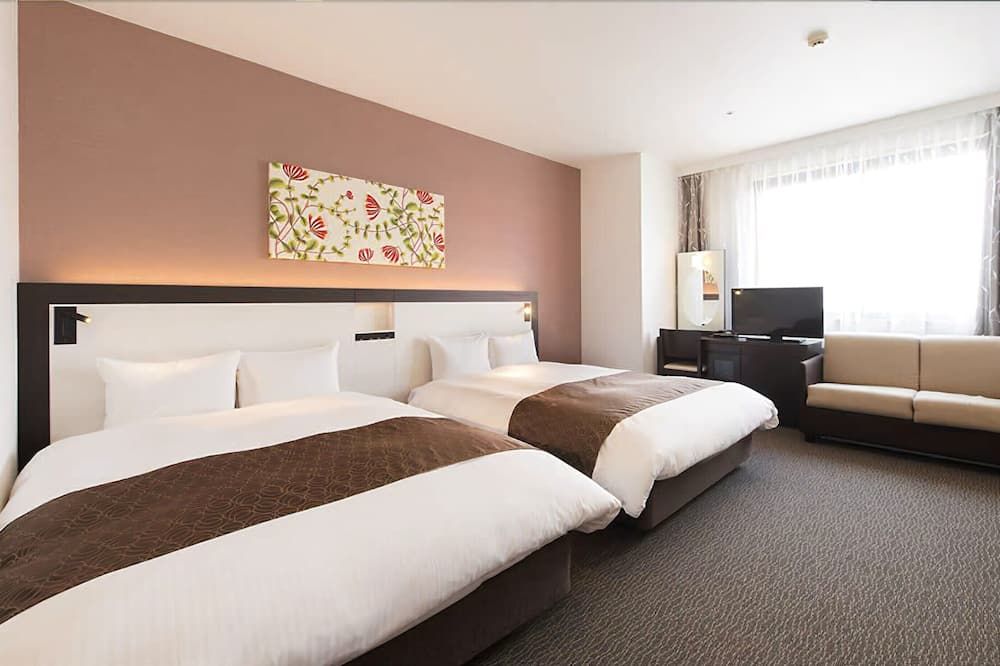 Osaka Airterminal Hotel - Toyonaka - Schlafzimmer