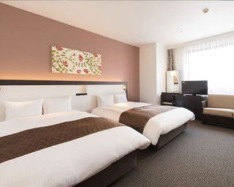 Osaka Airterminal Hotel - Toyonaka - Schlafzimmer