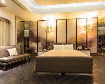Feng Cai Motel - Yuanlin City - Camera da letto