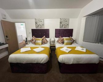 OYO 4 Sisters Inn - לינקולן - חדר שינה