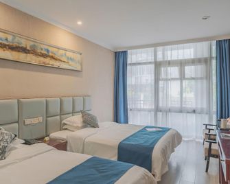 Yihaige Culture Hotel (Xiamen Zhongshan Pedestrian Street) - Xiamen - Bedroom