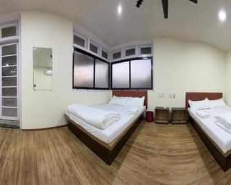 Hotel Marine Line - Mumbai - Phòng ngủ