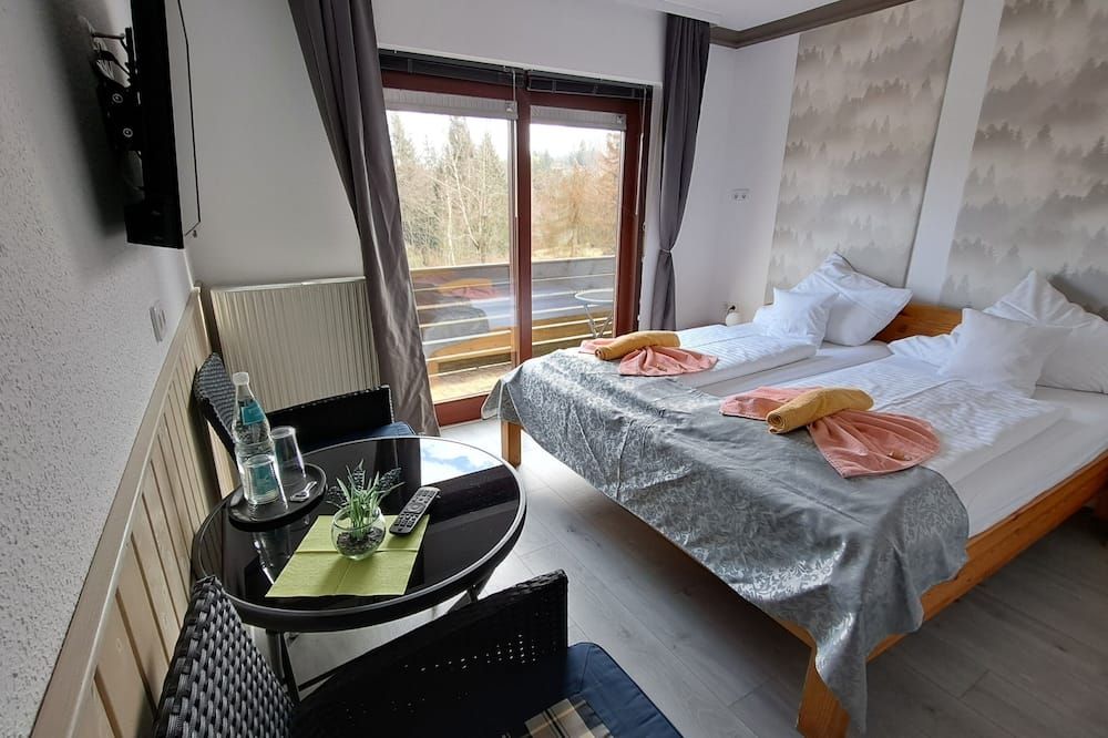 Comfort group house Quellenhof 27 pers. -Near the forest - Altenau (Niedersachsen) - Schlafzimmer