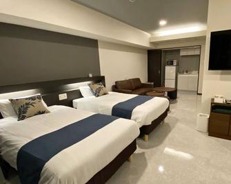 Tabinoteitaku Okinawa Naha 2nd - Naha - Schlafzimmer