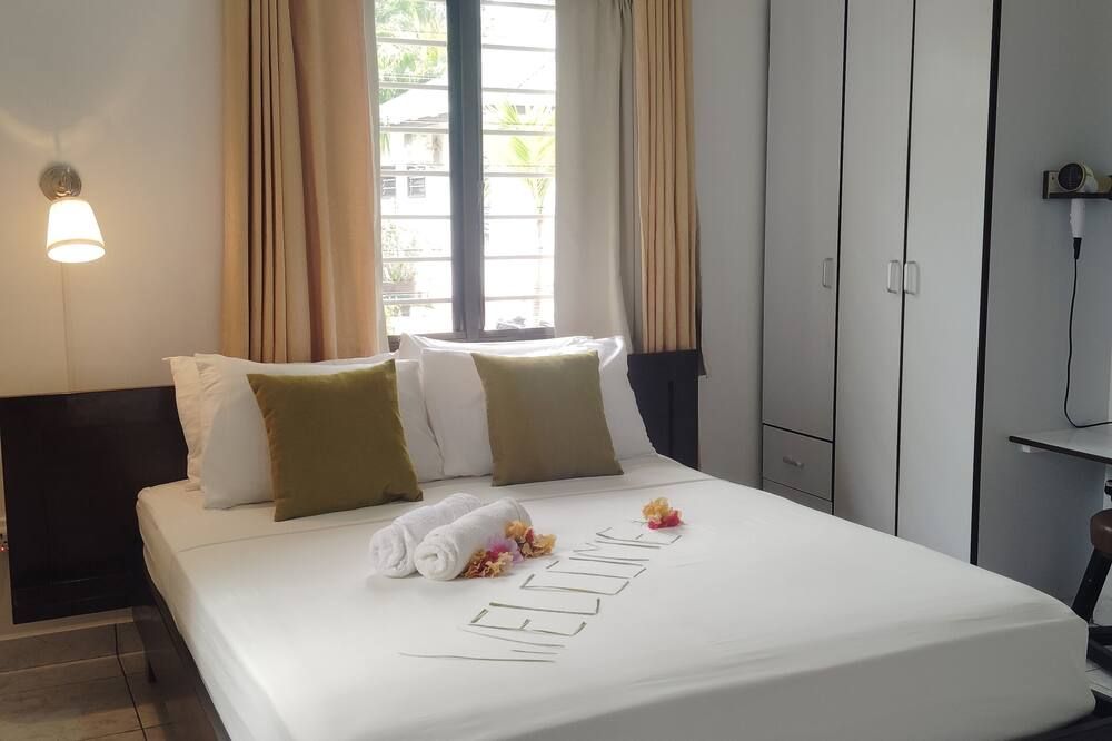 روش كيرلان أبارتمنتس - Grand'Anse Praslin - غرفة نوم