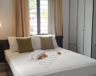 Roche Kerlan Apartments - Grand'Anse Praslin - Schlafzimmer