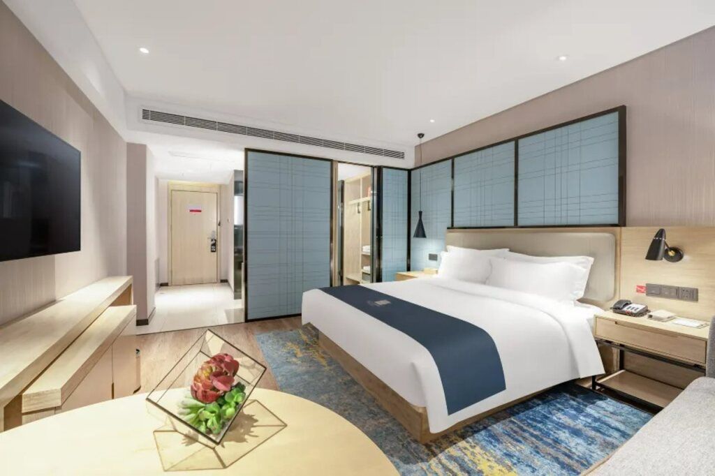 Echarm Hotel Zibo Gaoqing Zhongcheng Inernational - Zibo - Schlafzimmer