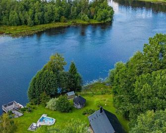 Ferienhaus auf einem Wassergrundstück in Alaska ähnlicher Natur - Kil - Utsikt