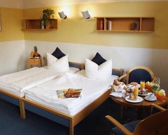 Hotel Regenbogenhaus - Freiberg - Bedroom