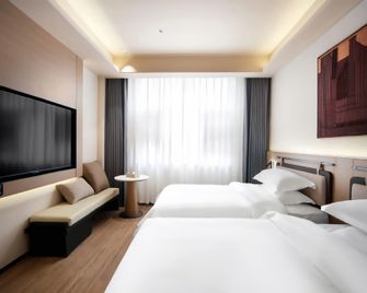 Zhicheng Boyue Boutique Hotel - Hanzhong - Спальня
