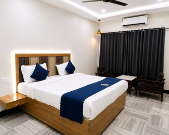 Hotel Jagapathi international - Віджайавада - Спальня