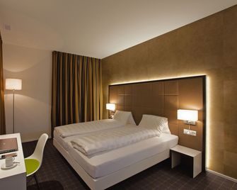 b_smart motel - Sevelen - Camera da letto