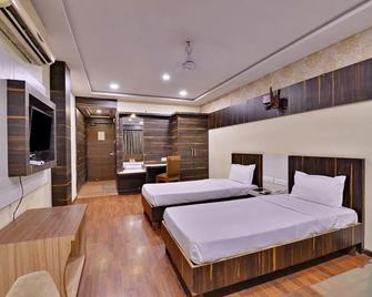 Hotel Puneet International - Raipur - Habitación