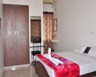 Hotel Sri Sakthi - Salem - Slaapkamer