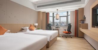 Changlong Hotel Qionghai - Qionghai - Bedroom