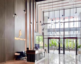 RedLiving Apartemen Royal Park Sentul by Bogor Staycation - Kota Bogor - Lobi