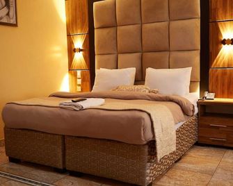 Coronia Hotel - Lagos - Schlafzimmer