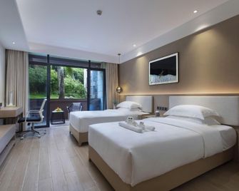 Huandao Beach Hotel - Sanya - Bedroom