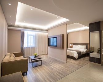 Home Inn Plus Jinan Quancheng Plaza - ז'ינאן - חדר שינה