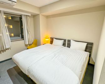 Checkinn Osaka Shinimamiya - Osaka - Habitación