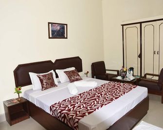 Hotel Lumbini International - Bodh Gaya - Habitación