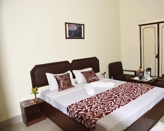 Hotel Lumbini International - Bodh Gaya - Habitación