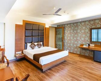 Hotel Seven Heaven - นาสิก - ห้องนอน