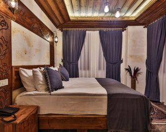 Garden Suites Hotel Cappadocia - גורמה - חדר שינה