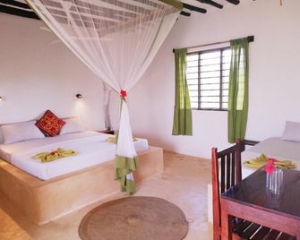 Red Monkey Beach Lodge - Jambiani - Schlafzimmer