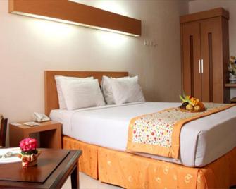 Ceria Hotel - Jambi - Bedroom