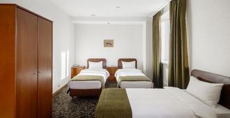 Benefit Plaza Hotel - Woronesch - Wohnzimmer
