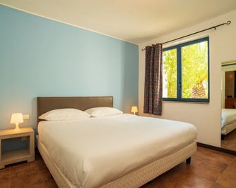 I Turchesi Club Village - Castellaneta Marina - Slaapkamer