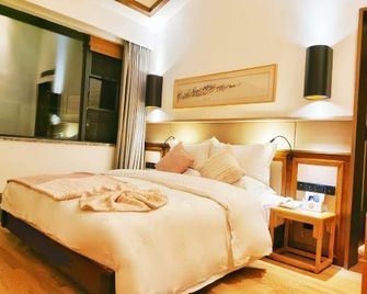 Daihong Hotel - Baoshan - Schlafzimmer