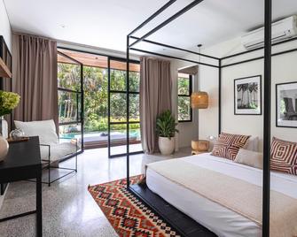 Villa Badoum guesthouse - North Kuta - חדר שינה