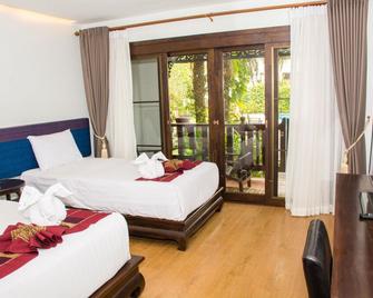 Phoomthai Garden Hotel - Phrae - Habitación