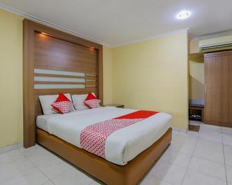 Hotel Senen Indah Syariah - Giacarta - Camera da letto