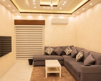 Prestige hotel apartment - Amman - Obývací pokoj