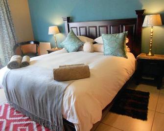 Amani Boutique Hotel And Conference Centre - Lydenburg - Bedroom