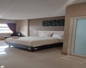 Super OYO Capital O 2018 Ring Road Guest House Syariah - Banda Aceh - Bedroom