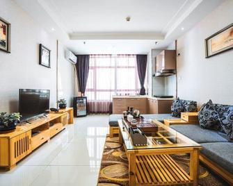 Changji Rongjin Hotel Apartment - Changji - Living room
