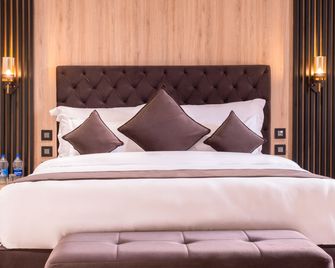 Alpine hotel and villas - Pālampur - Schlafzimmer